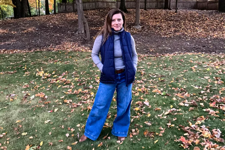 Cropped Puffer Vests Layered Over Long Sleeve Shirts and Sweaters